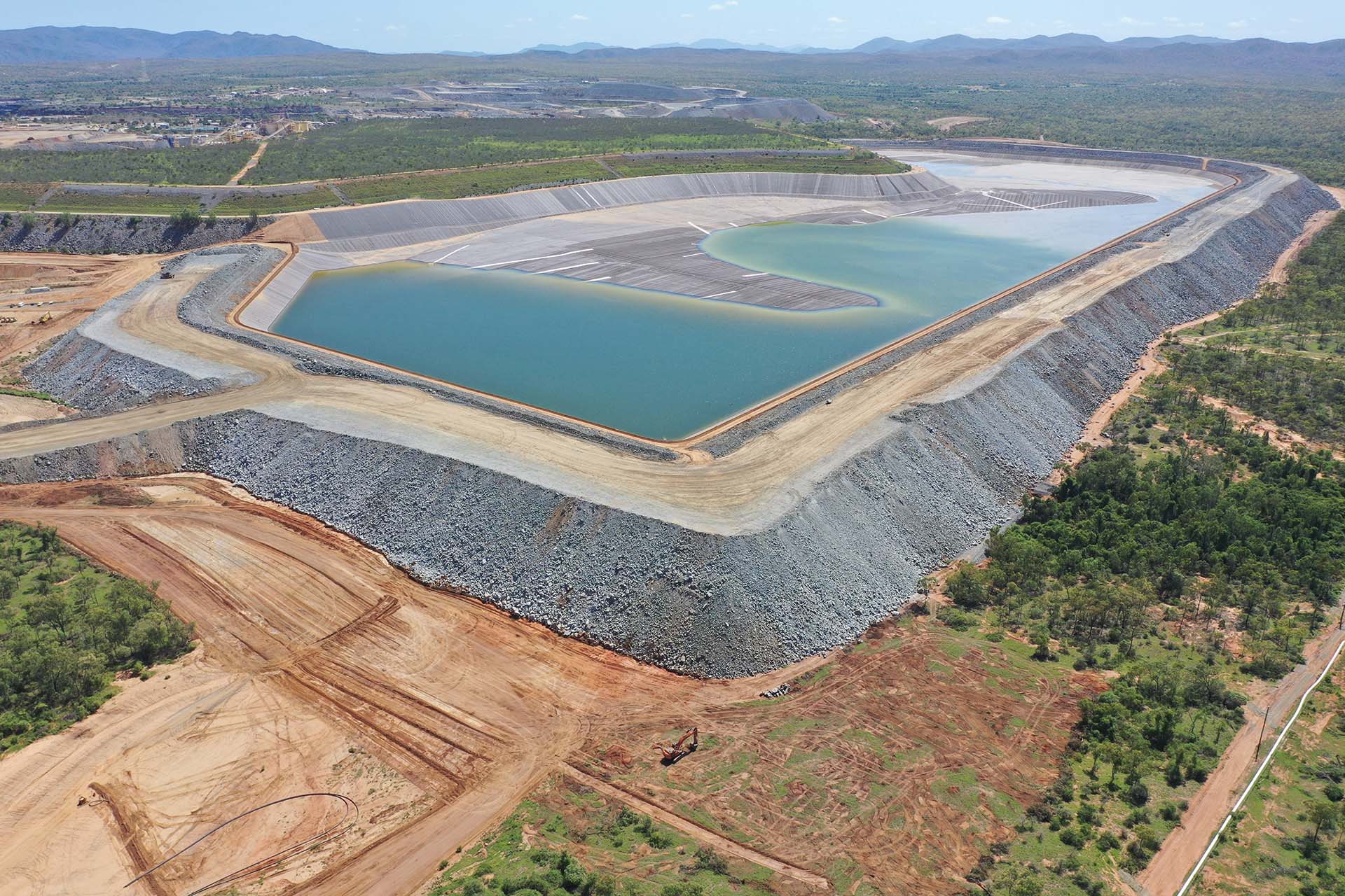 image of a dangerous tailings dam that can be solved by a decanter centrifuge